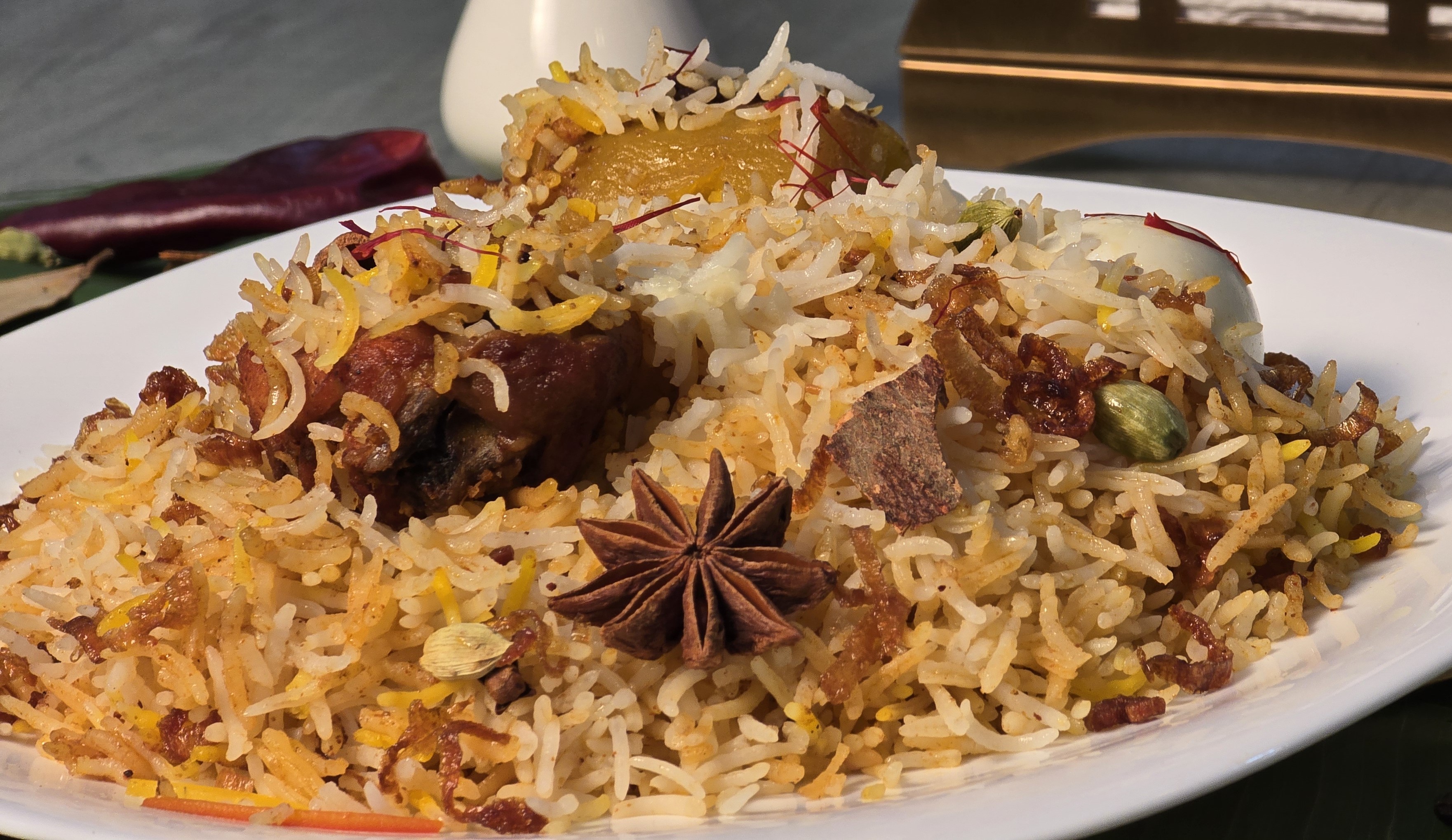 Hyderabadi biryani served in a premium bowl